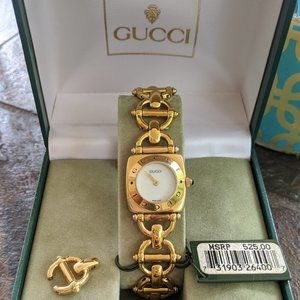 Gucci gold watch